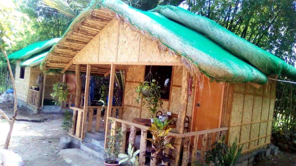 אלמינוס Traditional Filipino Transient House And Huts Near 100 Islands Wharf מראה חיצוני תמונה