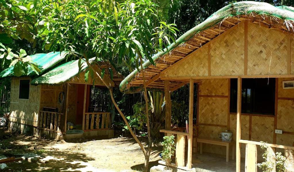 אלמינוס Traditional Filipino Transient House And Huts Near 100 Islands Wharf מראה חיצוני תמונה