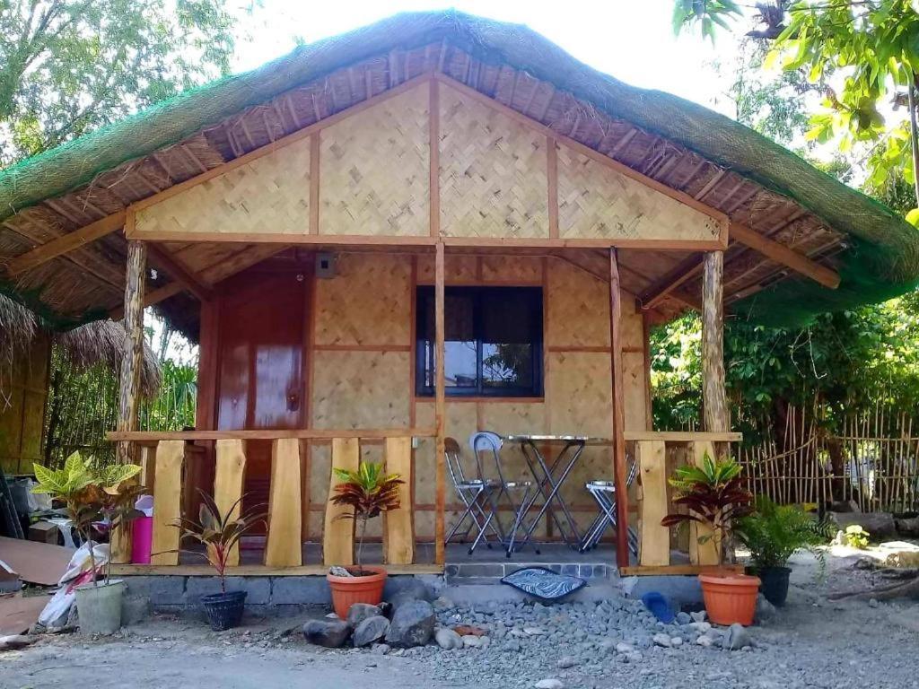 אלמינוס Traditional Filipino Transient House And Huts Near 100 Islands Wharf מראה חיצוני תמונה
